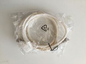 Coiled cable in plastic packaging
